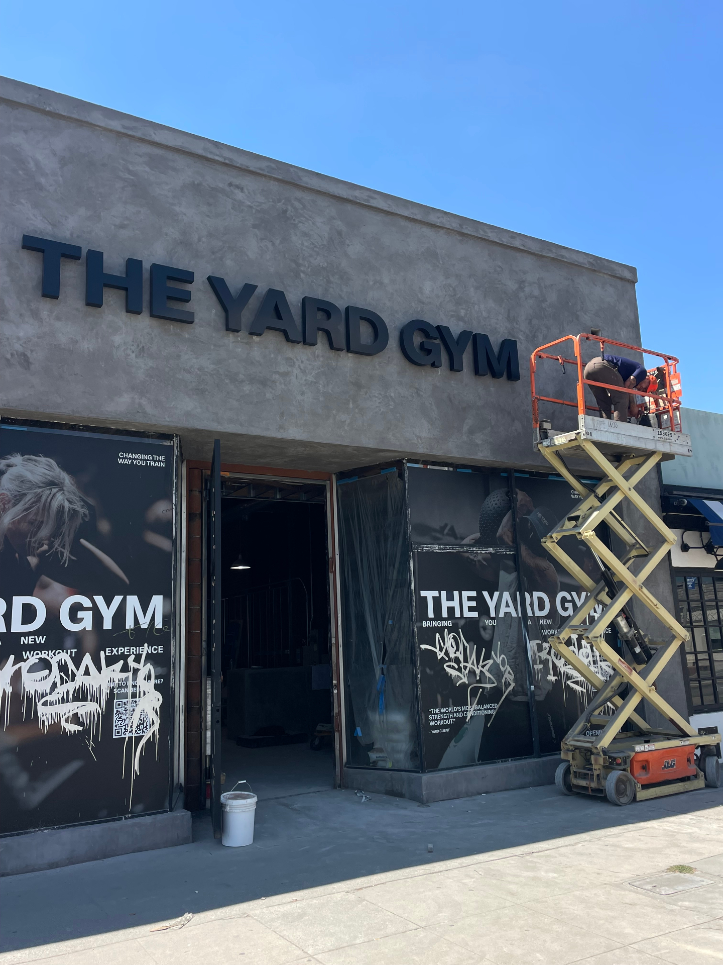 The Yard WeHo during construction with scissor lift
